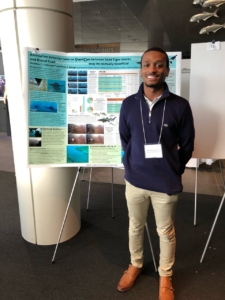 C-StREAM Fellow Nick Coleman standing next to his award-winning poster at the Spring 2019 Southeastern Estuarine Research Society (SEERS) conference