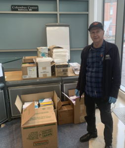 IMET Director Russell Hill with boxes of personal protective equipment donations for the University of Maryland Medical System. Credit: UMCES