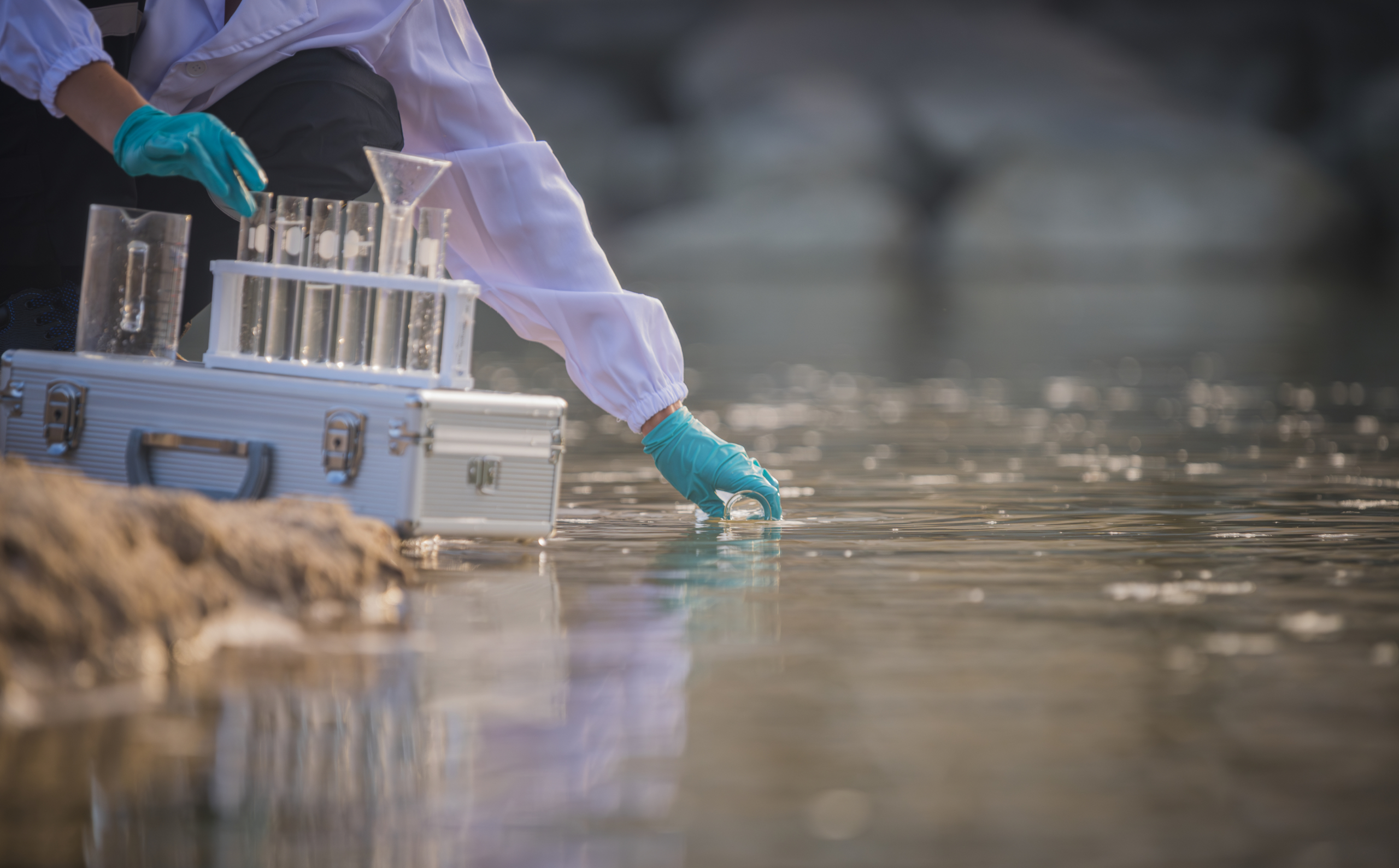 scientist-wearing-protective-uniform-and-glove-und-2025-03-16-20-11-09-utc